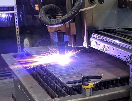 Plasma cutting on the Wayne Metals shop floor, live sparks