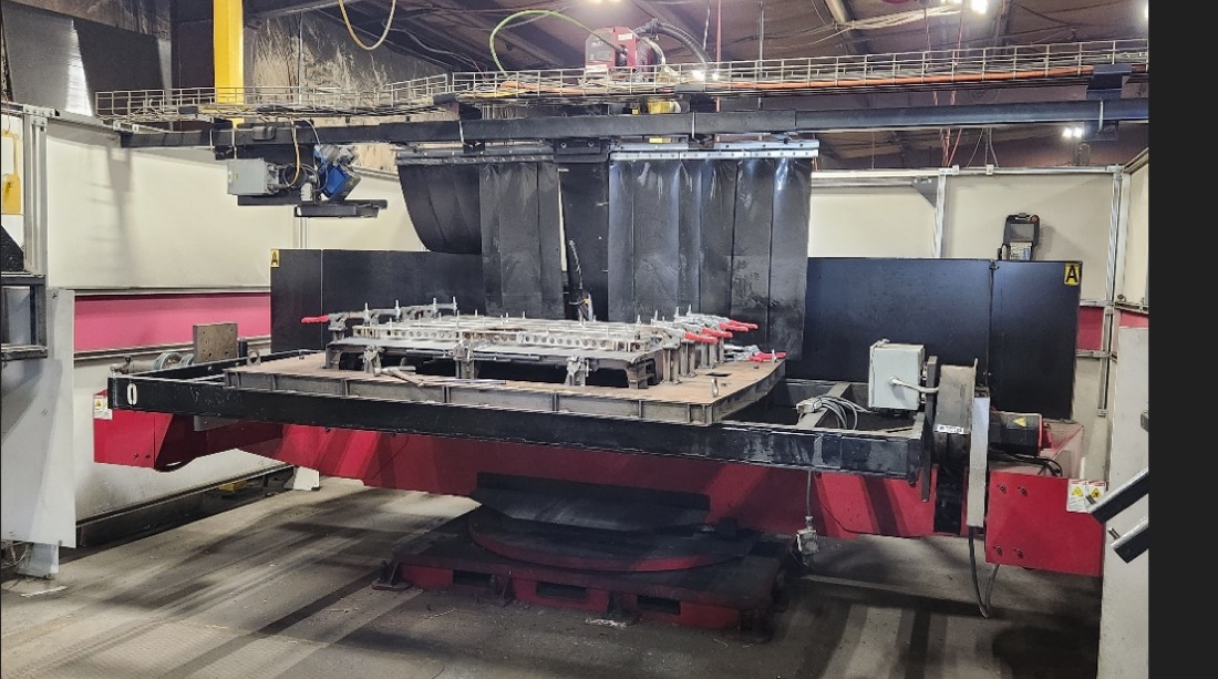 Robotic welding positioner cell